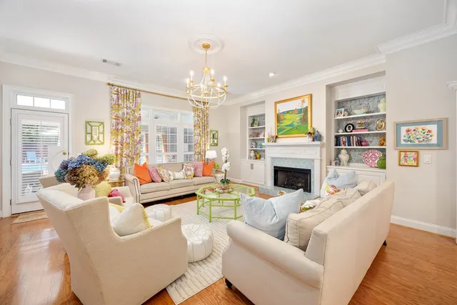 a white stove top oven sitting inside of a kitchen