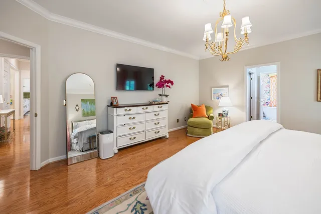 a living room with furniture fireplace and flat screen tv