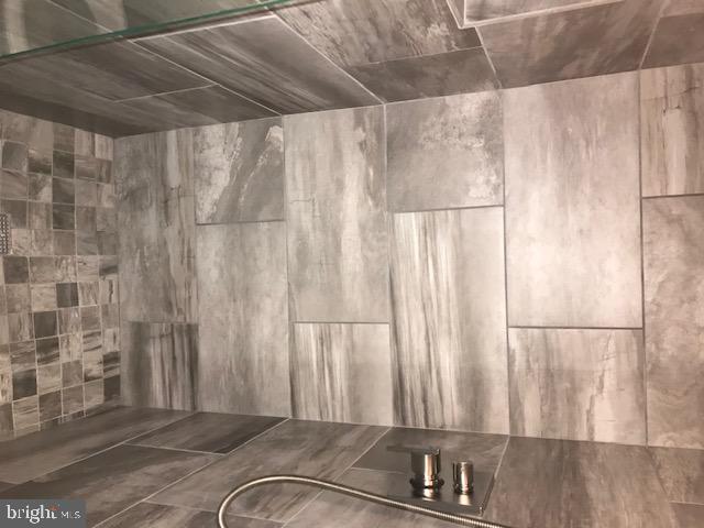 717 Rusty Anchor Road, Unit 4 Ocean City, MD 21842 - Photo 31 of 93 Check out the custom tile in all 3 baths!