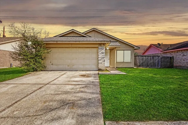 a front view of a house with yard