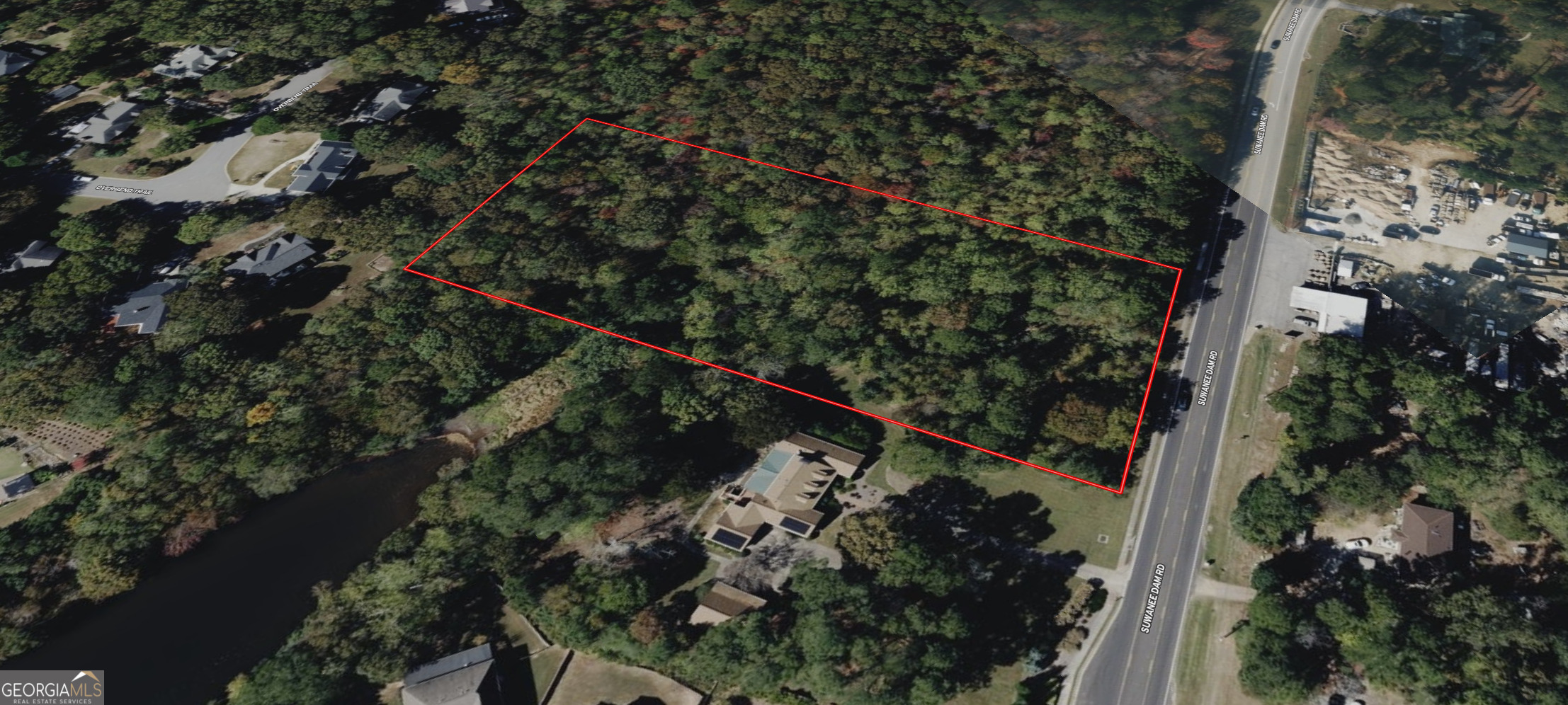 0 Suwanee Dam Road Suwanee, GA 30024 - Photo 43 of 45 an aerial view of a residential houses with yard