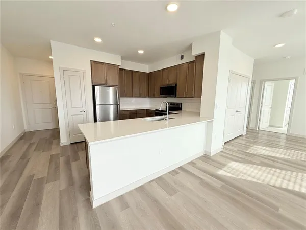 $2,705 | 3900 PGA Parkway, Unit 2202, Frisco, TX 75033