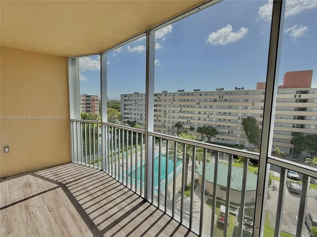 a view of a balcony with an ocean view