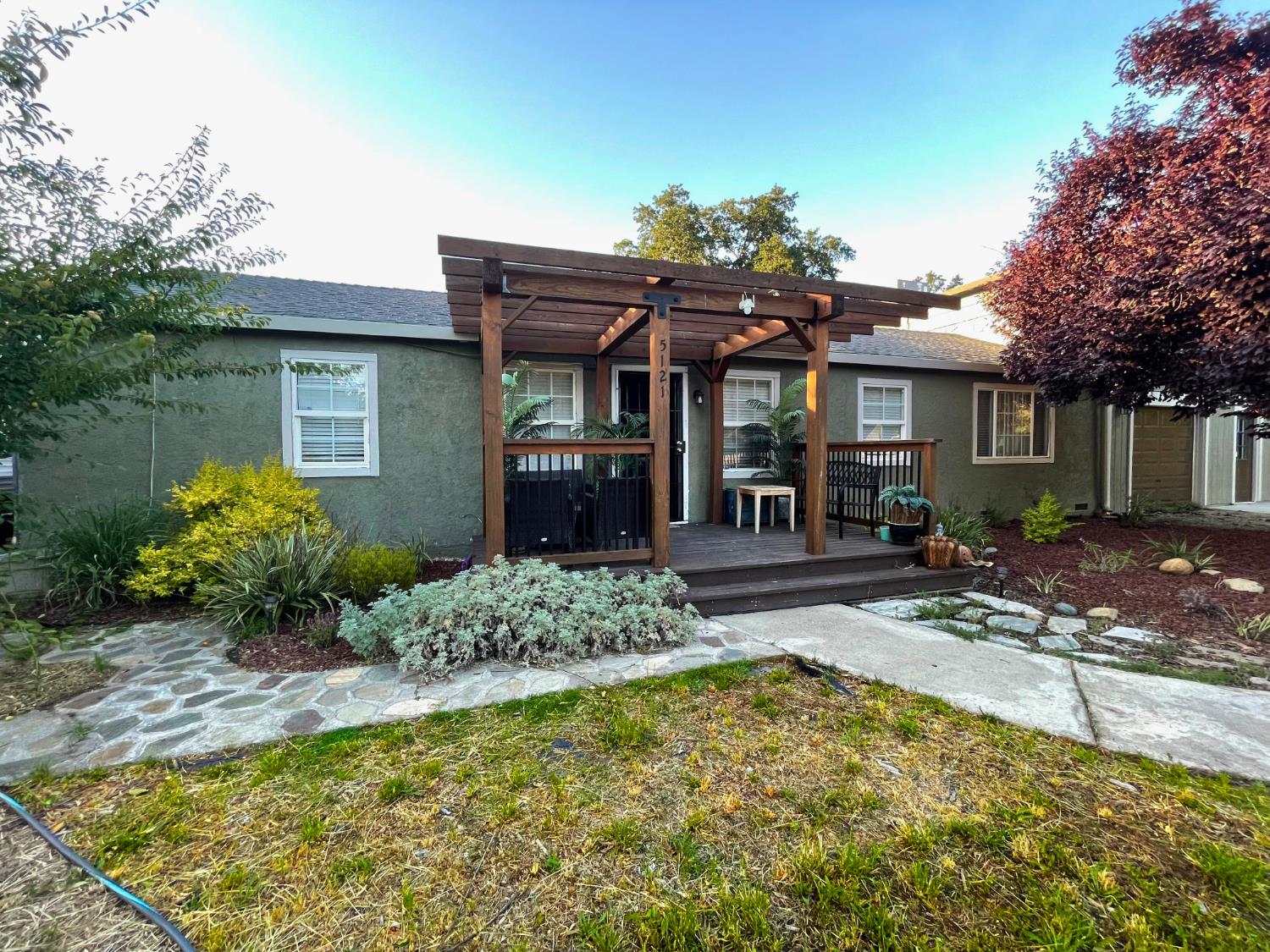 5121 Kenneth Avenue Carmichael, CA 95608 - Photo 2 of 38 a view of a house with swimming pool and sitting area
