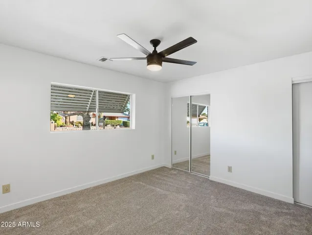 a view of an empty room with window