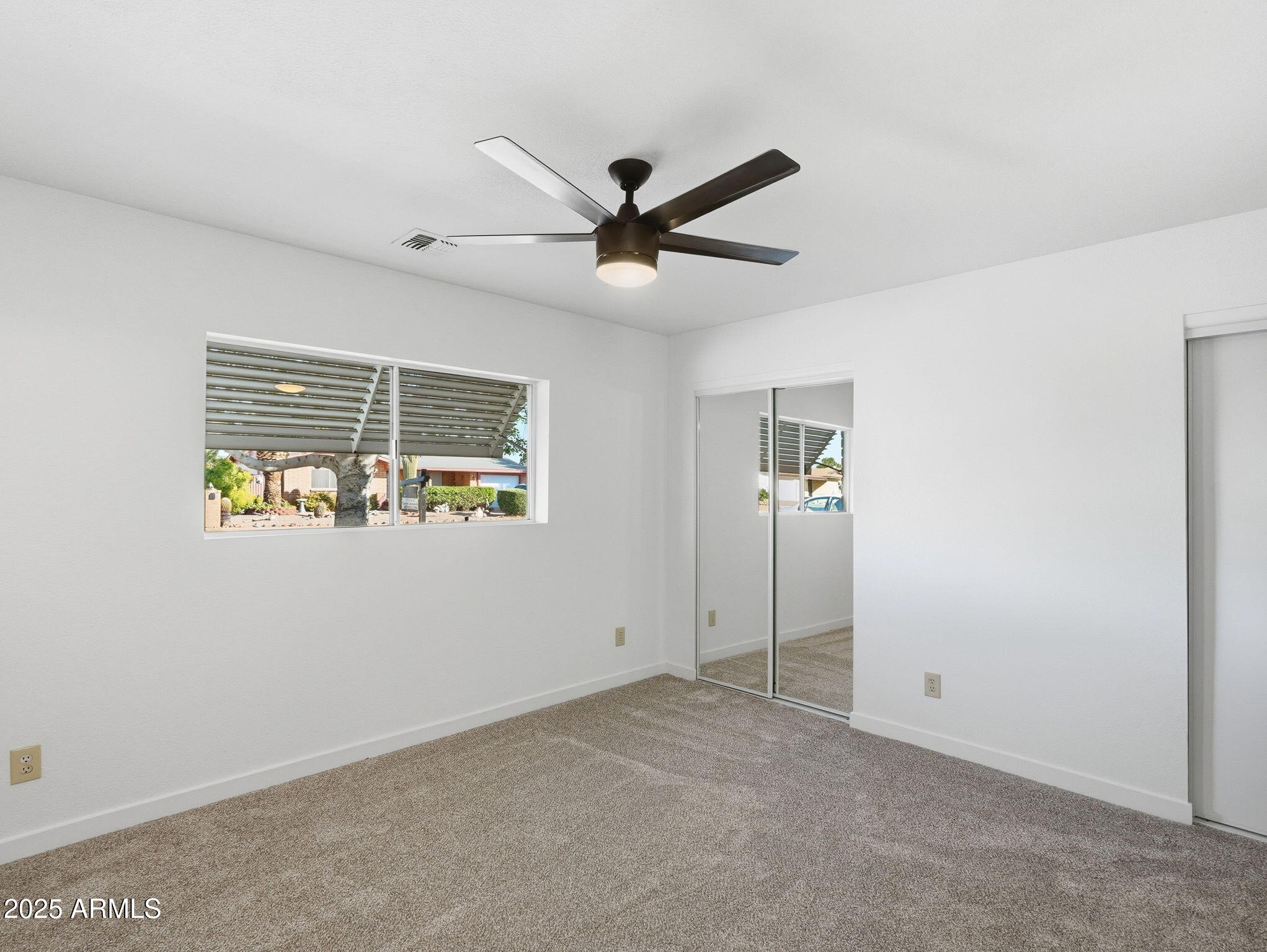 1428 South Palo Verde Drive Apache Junction, AZ 85120 - Photo 21 of 37 a view of an empty room with window