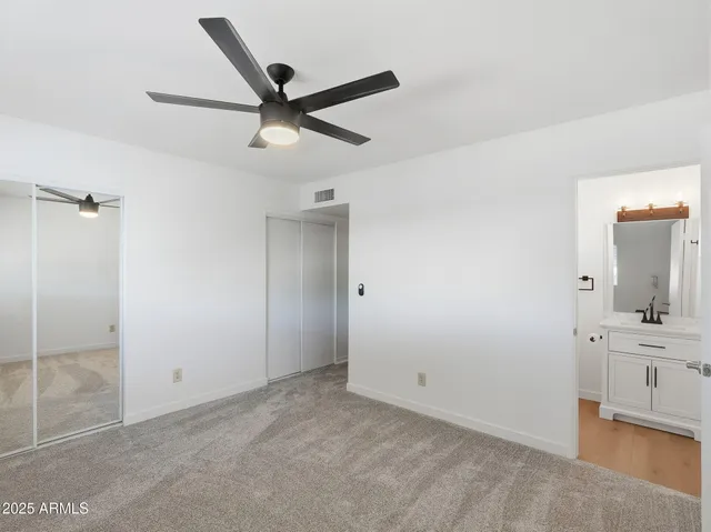 a view of a hallway with a sink