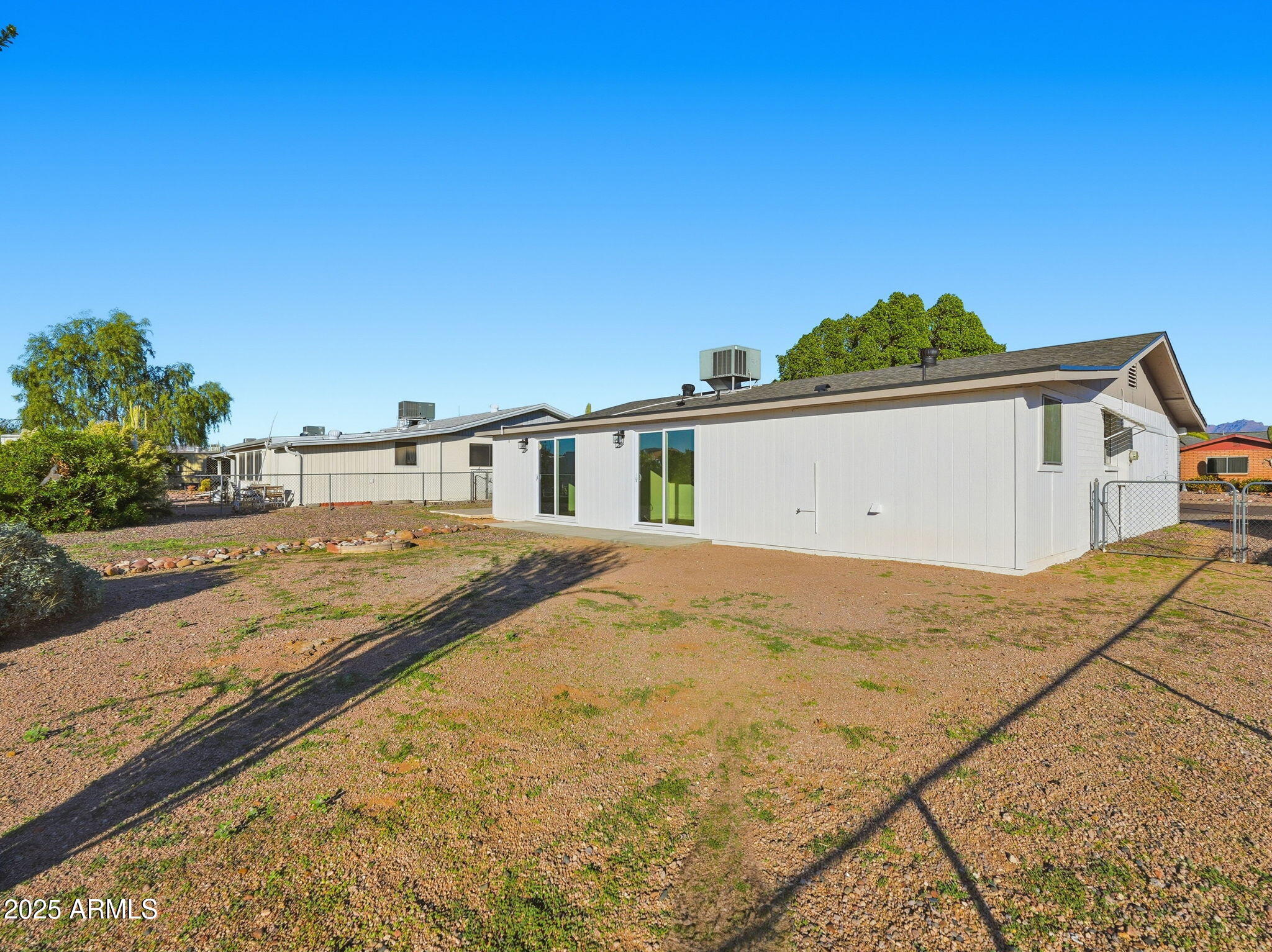 1428 South Palo Verde Drive Apache Junction, AZ 85120 - Photo 33 of 37 a view of the house with basketball court