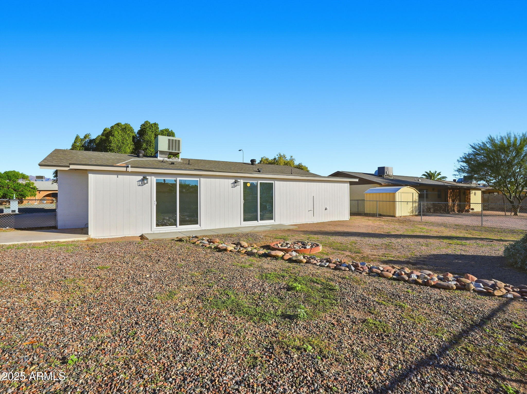 1428 South Palo Verde Drive Apache Junction, AZ 85120 - Photo 34 of 37 a front view of a house with a yard