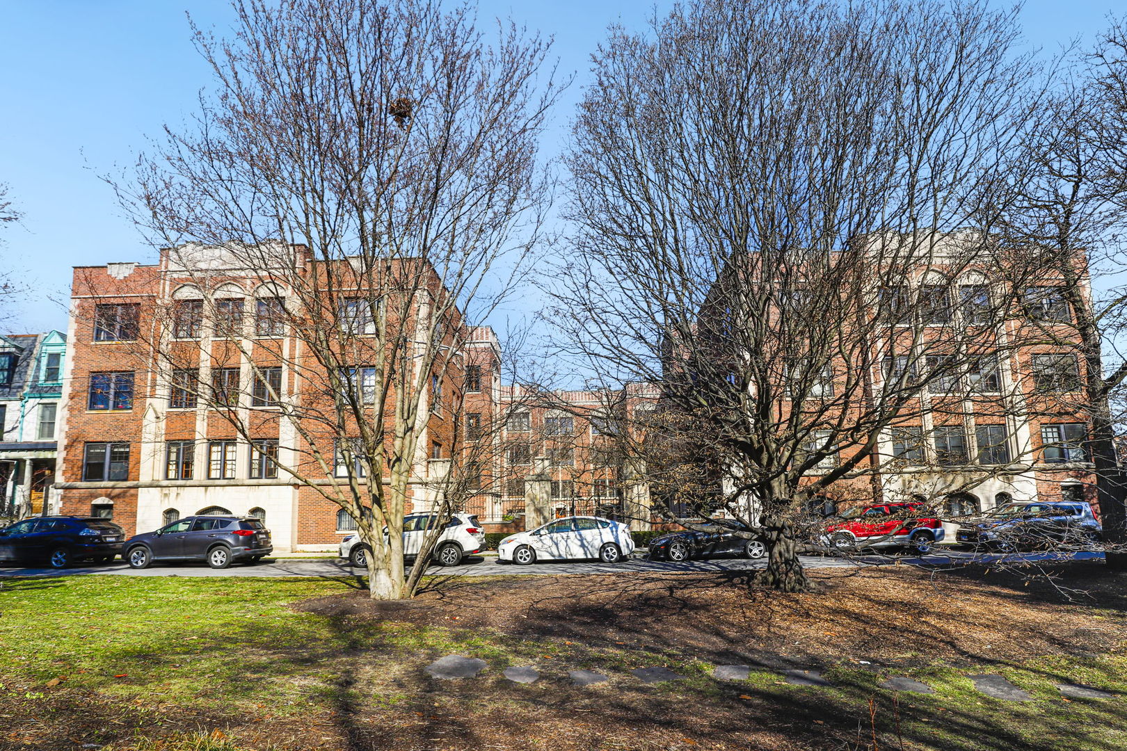 1360 East Madison Park, Unit B Chicago, IL 60615 - Photo 24 of 25 a view of a parked cars in front of a building