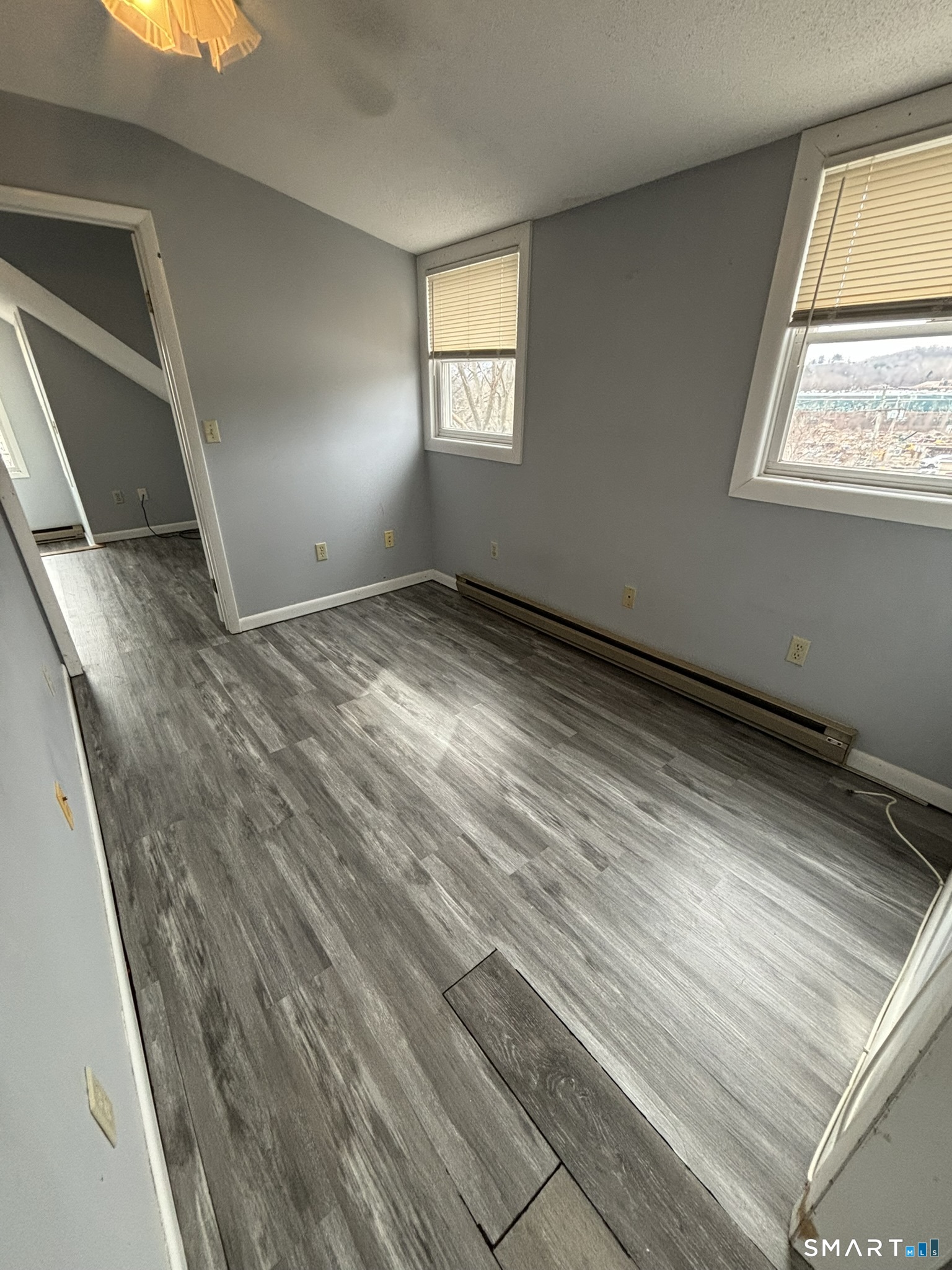 11 Roberts Street, Unit 3 Bristol, CT 06010 - Photo 7 of 11 a view of empty room with window