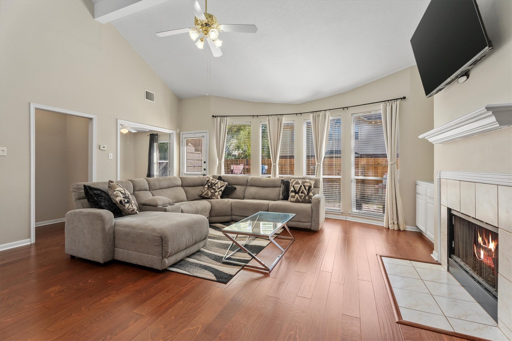3315 La Seine Lane Spring, TX 77388 - Photo 15 of 31 a living room with furniture flat screen tv and a fireplace