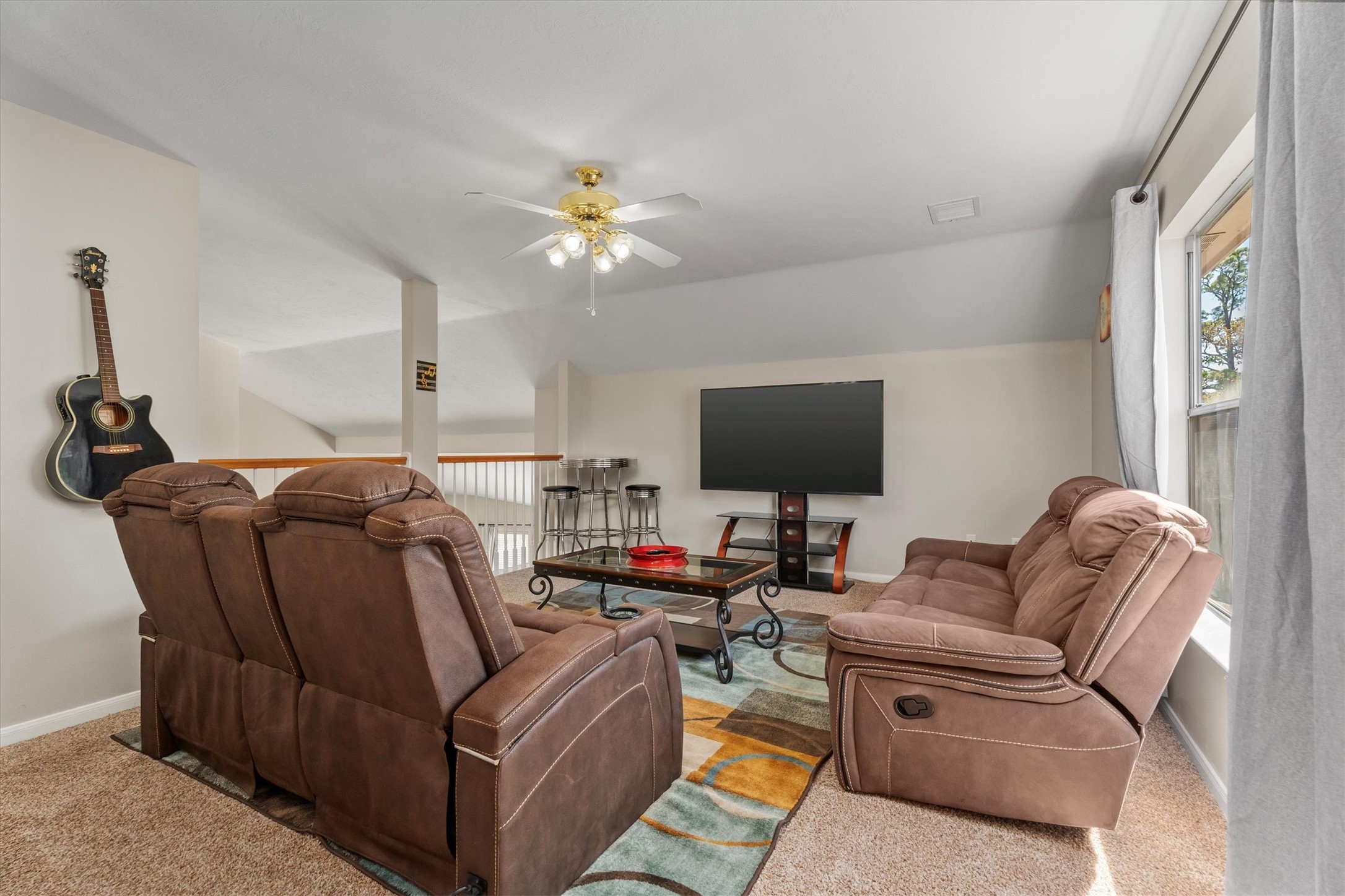 3315 La Seine Lane Spring, TX 77388 - Photo 22 of 31 a living room with furniture and a flat screen tv