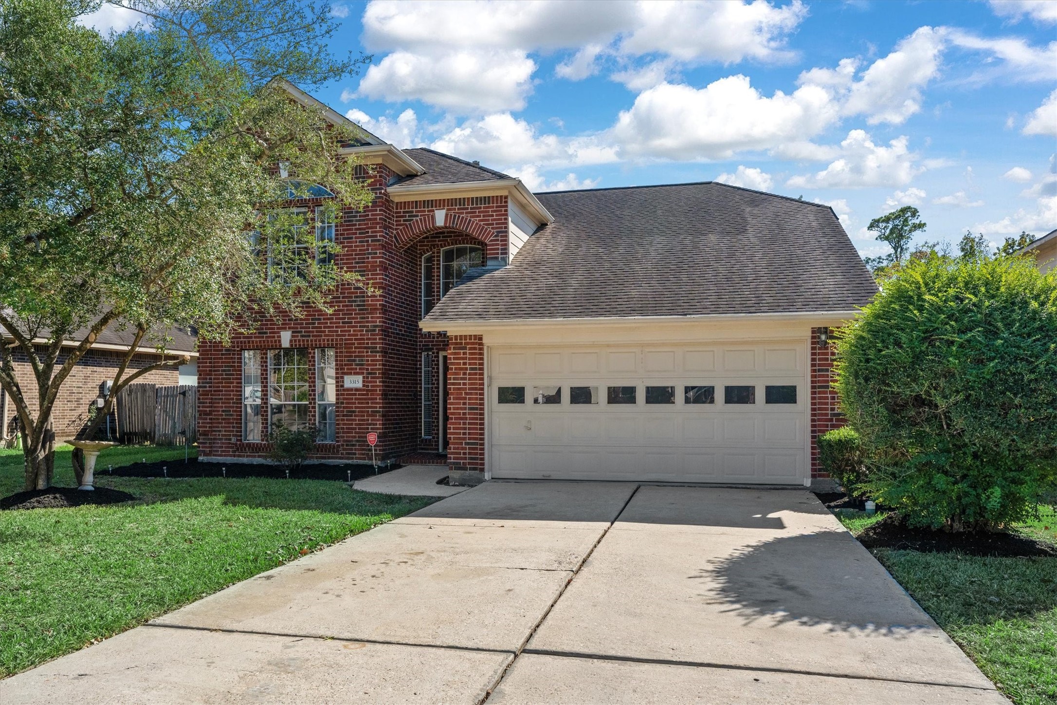 3315 La Seine Lane Spring, TX 77388 - Photo 3 of 31 a view of a building with a yard