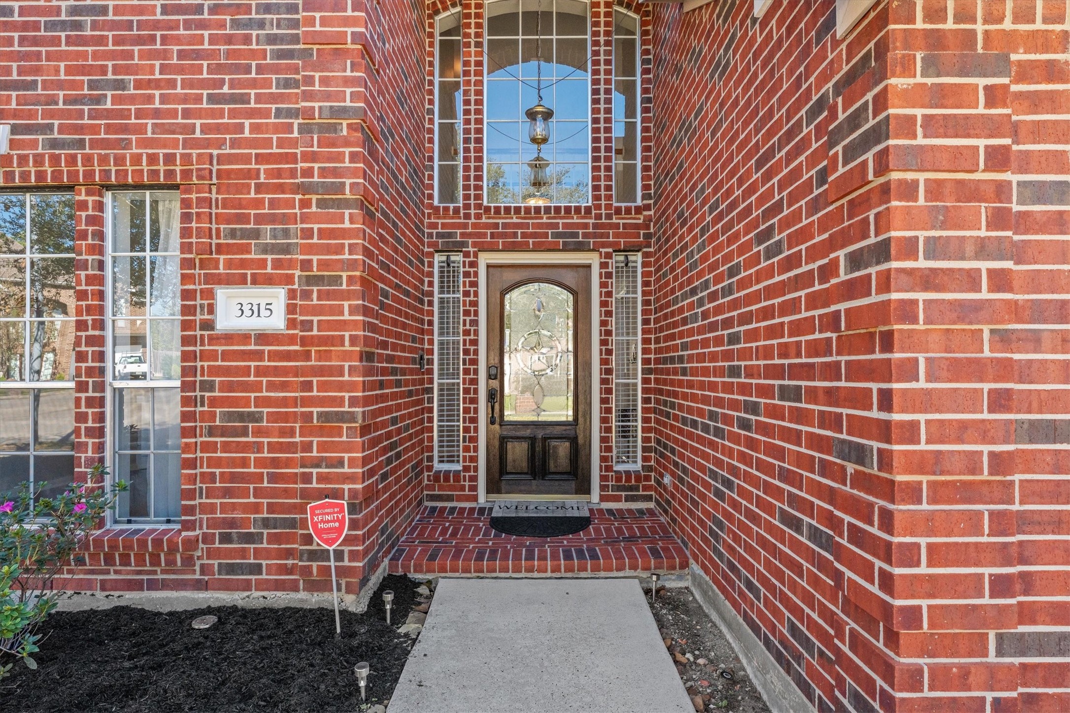 3315 La Seine Lane Spring, TX 77388 - Photo 4 of 31 a view of a brick building with many windows