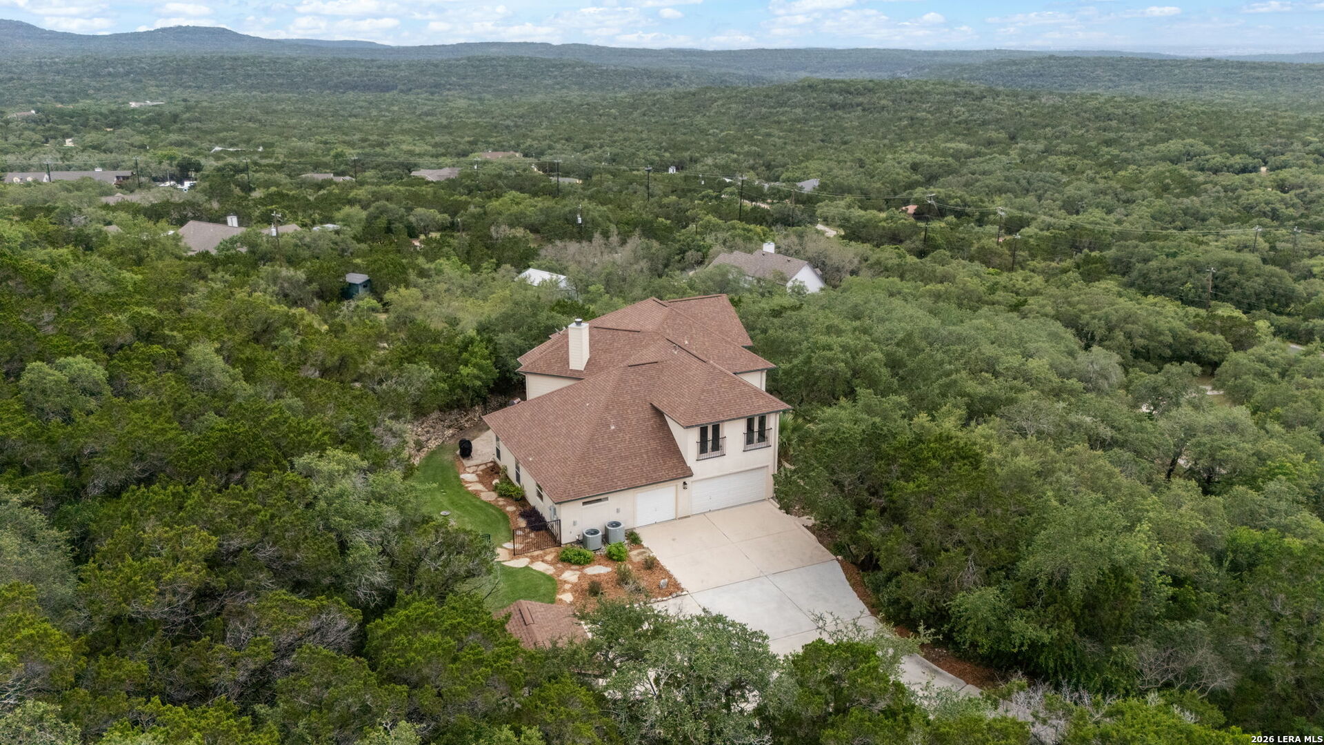 17431 Helotes Spring Road Helotes, TX 78023 - Photo 47 of 50 an aerial view of a house with a yard
