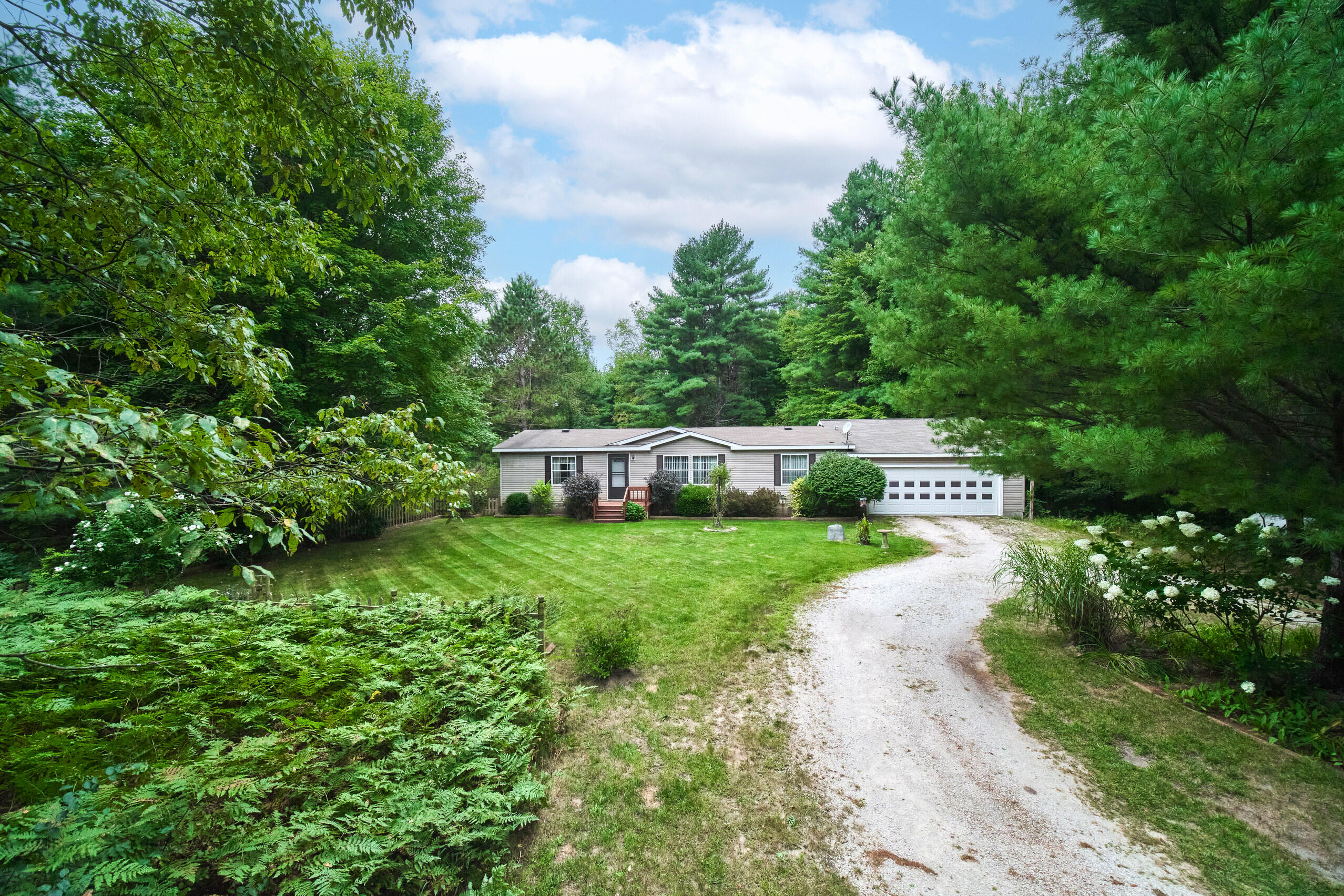 4825 North Weber Road Whitehall, MI 49461 - Photo 1 of 47 4825_N_Weber-49