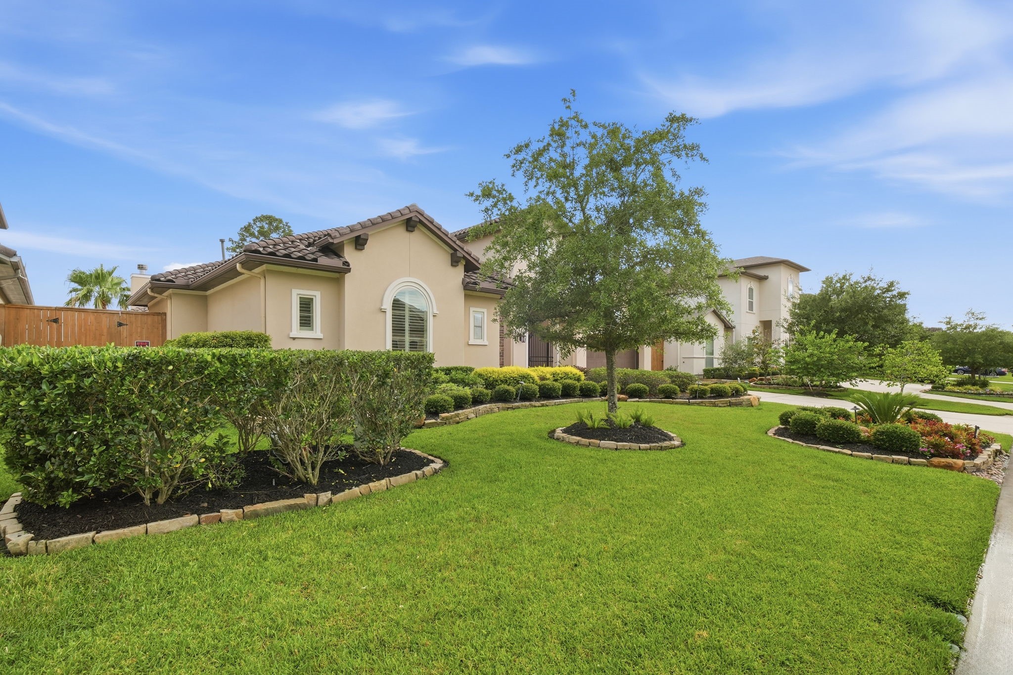 5815 Stratton Woods Drive Spring, TX 77389 - Photo 5 of 45 a front view of a house with garden