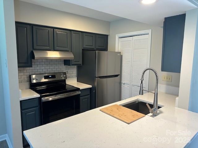 11169 Harrowfield Road Charlotte, NC 28226 - Photo 2 of 9 a kitchen with a refrigerator and a sink