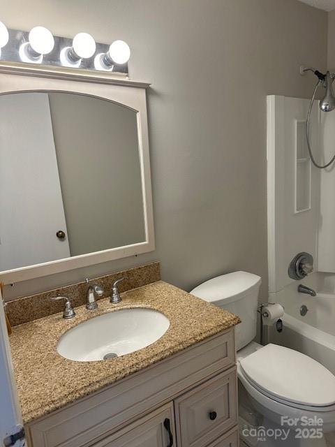 11169 Harrowfield Road Charlotte, NC 28226 - Photo 6 of 9 a bathroom with a granite countertop toilet a sink and mirror