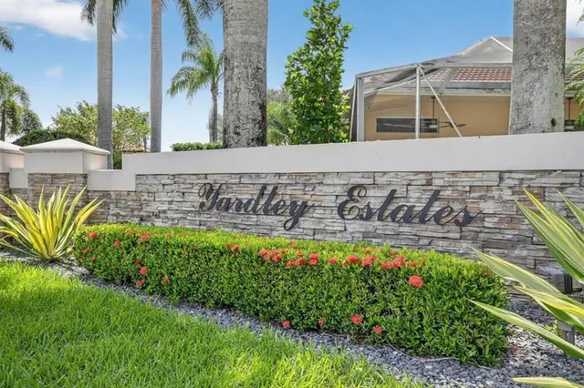 a view of a swimming pool with a garden