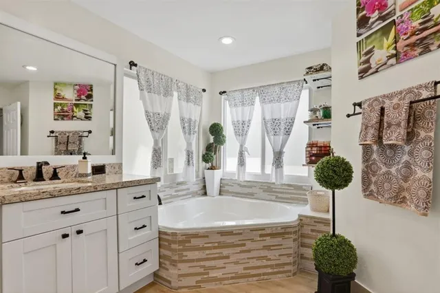 a bathroom with a shower and a sink