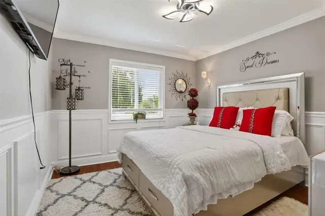 a view of a house with backyard sitting area and garden