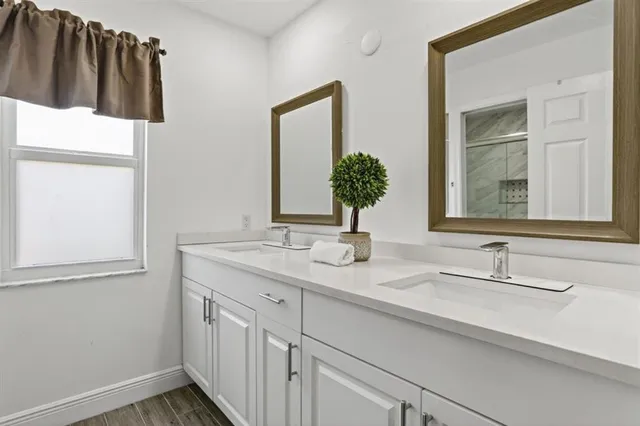 a view of a backyard with swimming pool