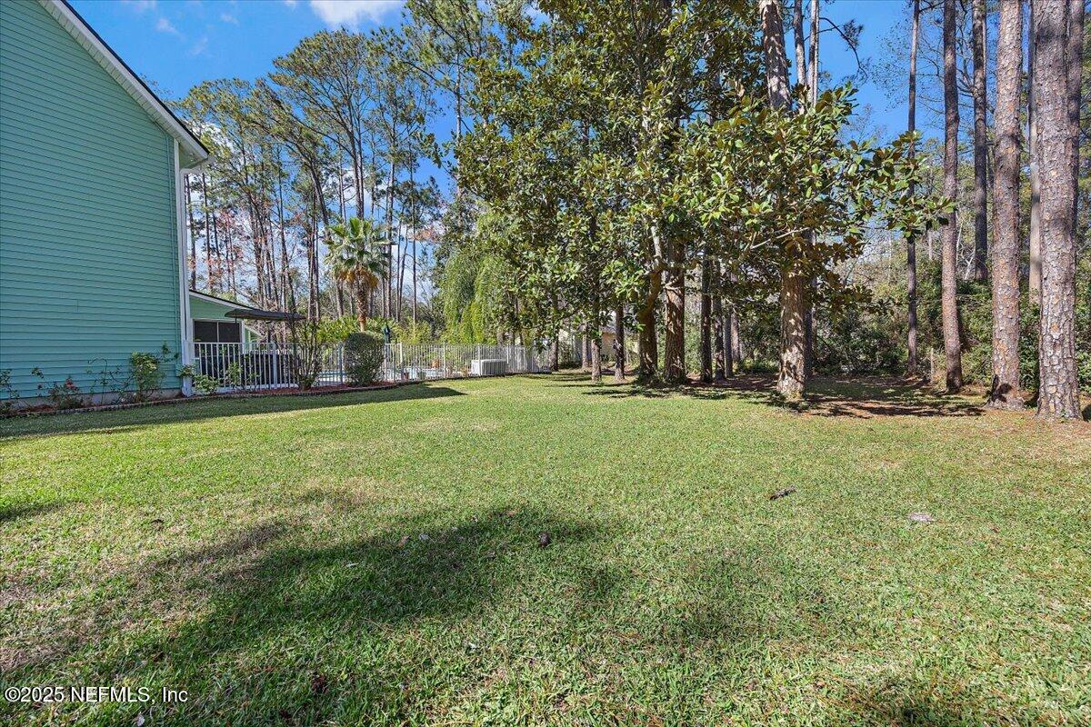 415 Bald Eagle Road Fleming Island, FL 32003 - Photo 27 of 27 a view of a park with large trees