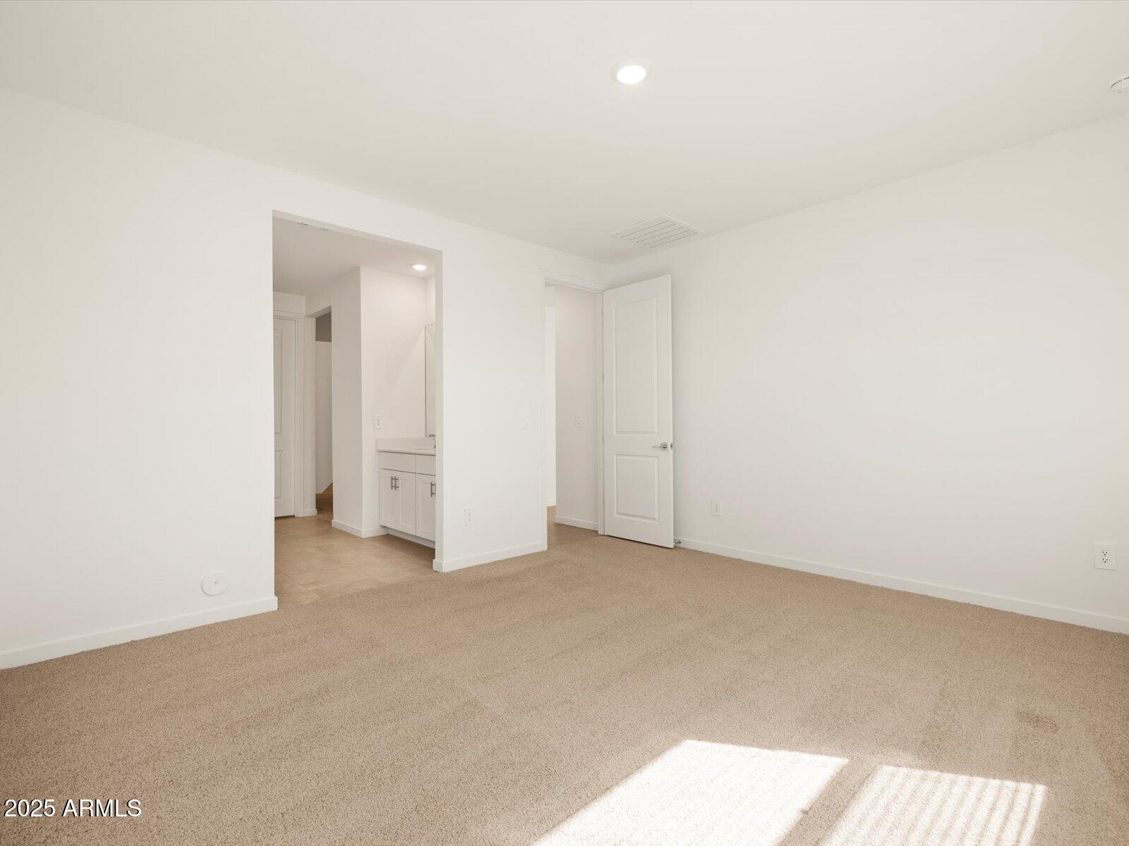 2426 Grenache Road San Tan Valley, AZ 85143 - Photo 10 of 73 an empty room with an entryway