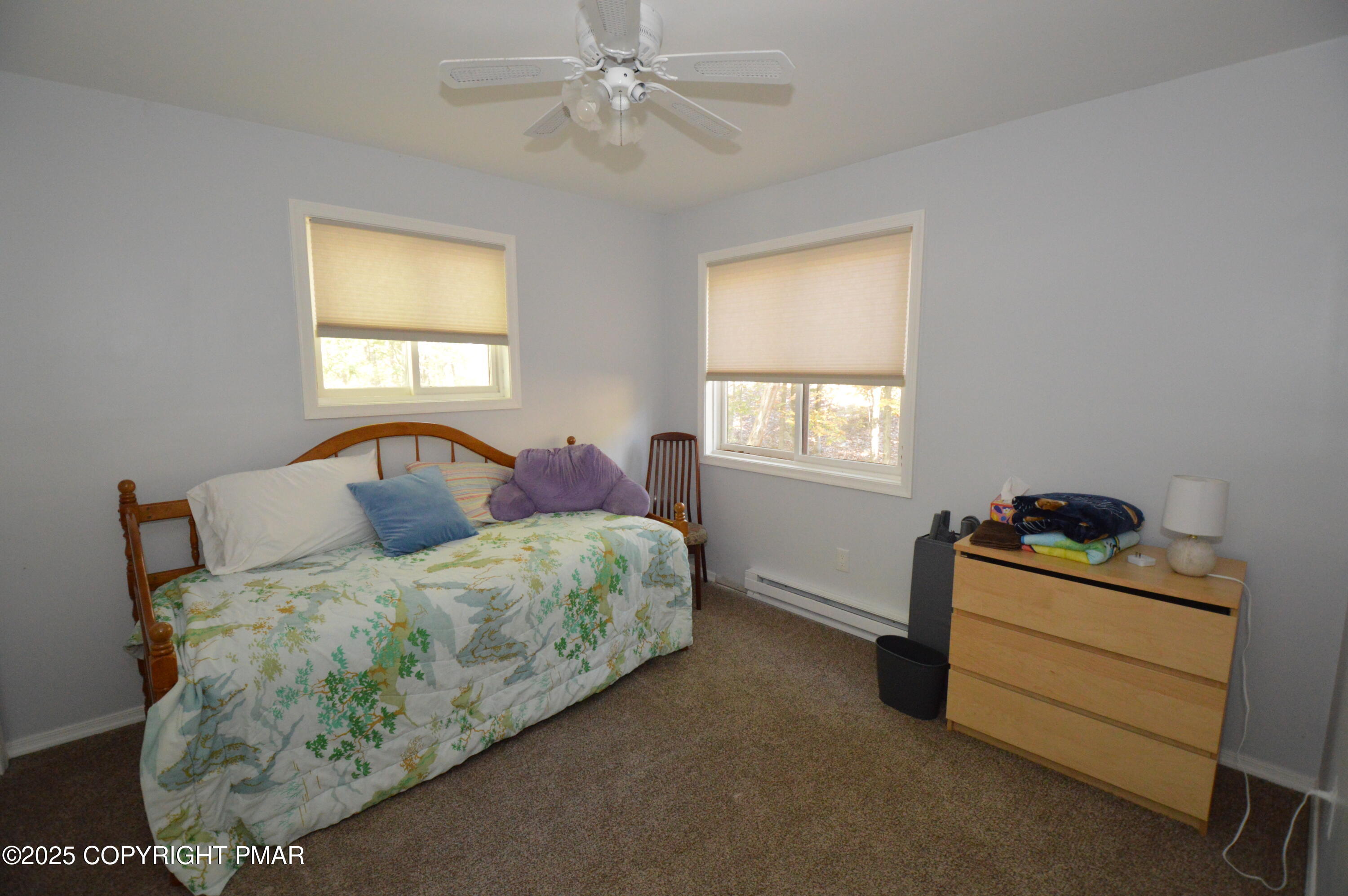 128 Ashley Court Bushkill, PA 18324 - Photo 14 of 43 a bedroom with a bed and window