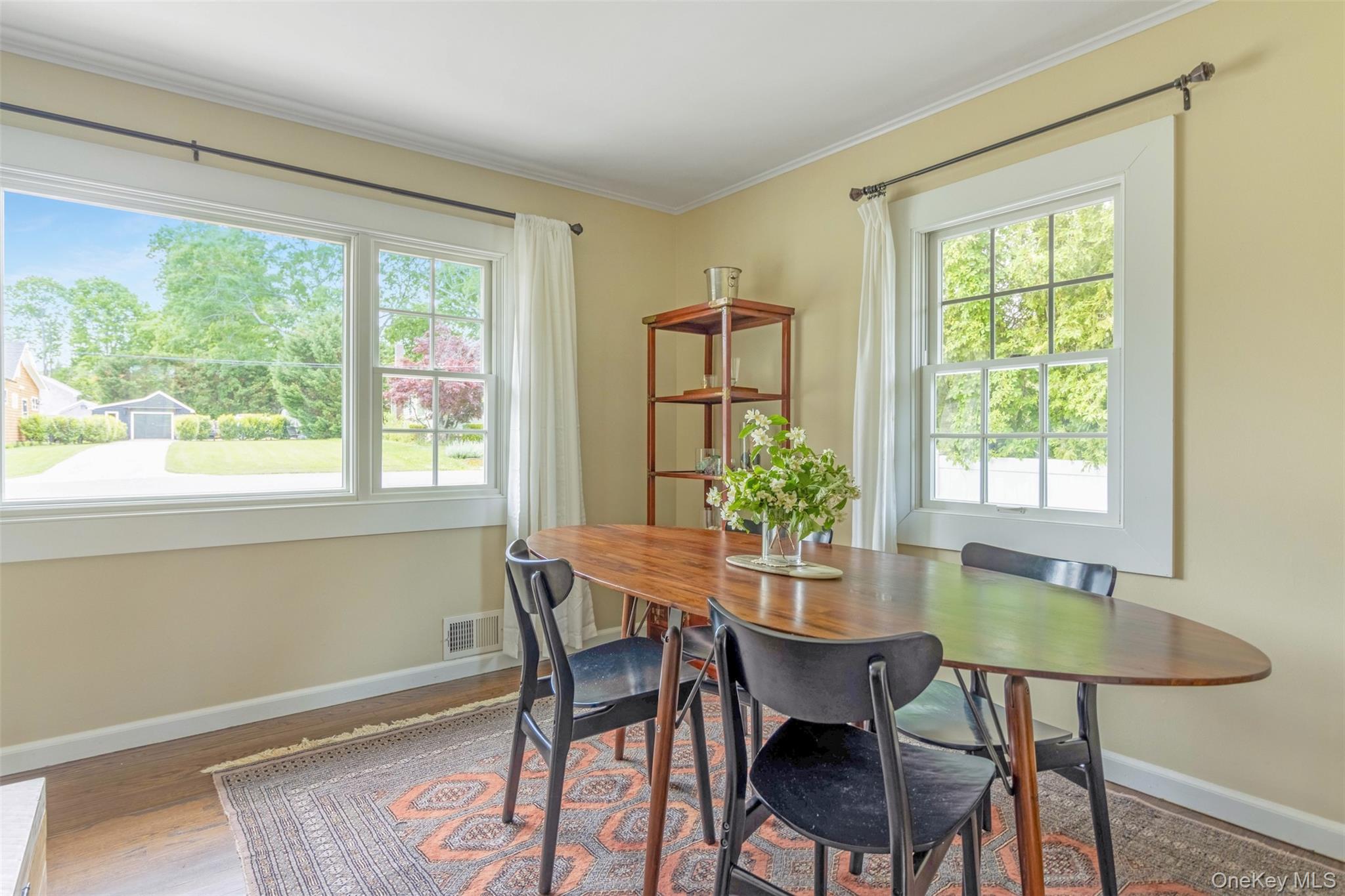315 Wicks Road New Suffolk, NY 11956 - Photo 7 of 28 a view of a dining room with furniture and window
