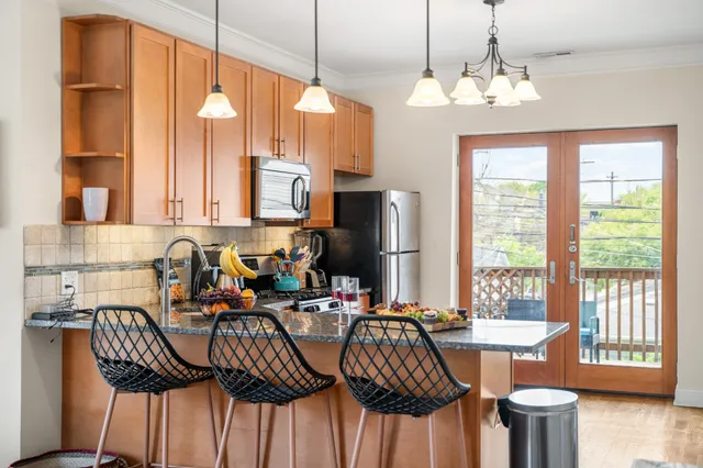 a view of a dining room with furniture window and outside view