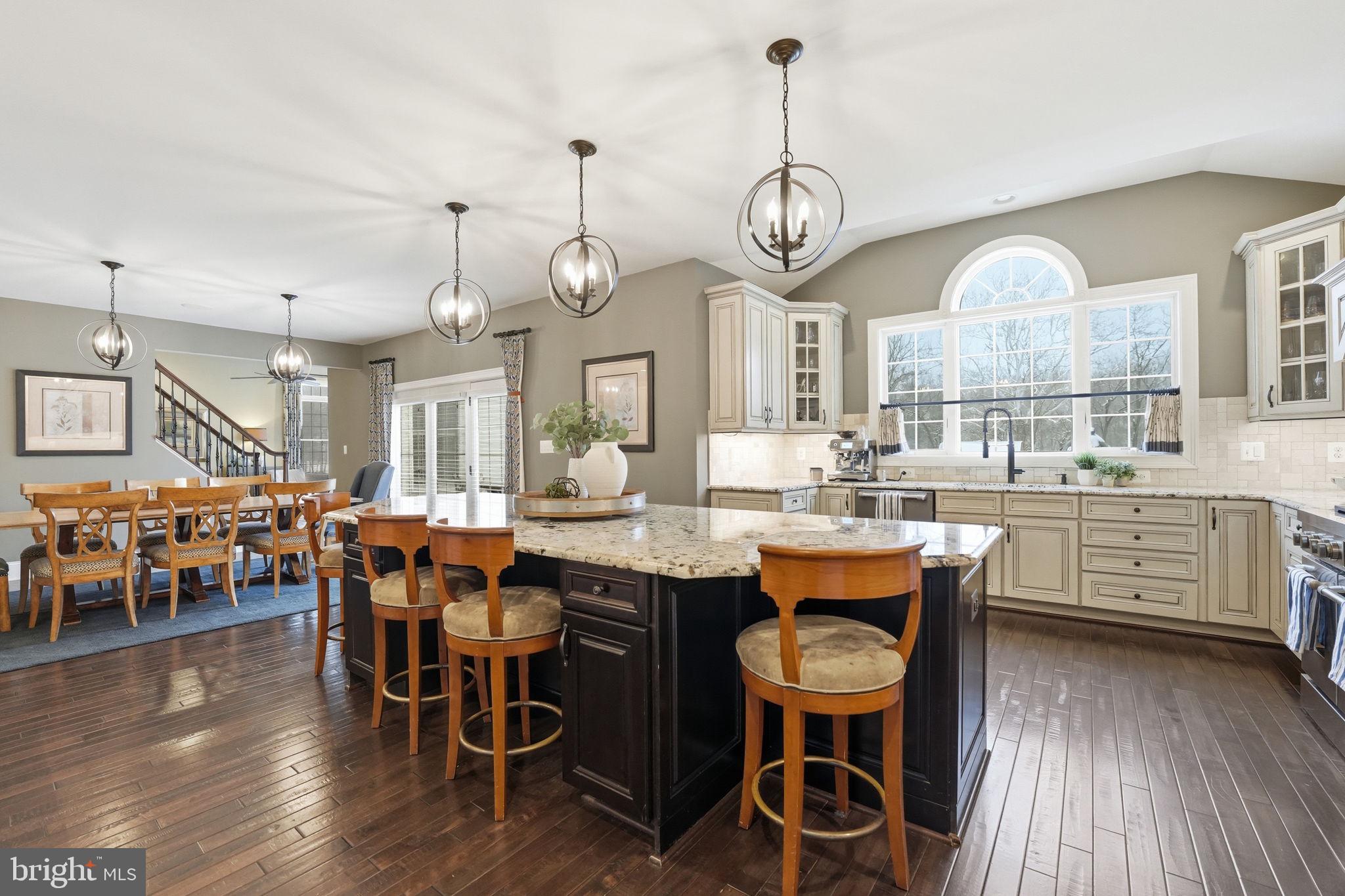 17972 Running Colt Place Leesburg, VA 20175 - Photo 25 of 99 a view of a dining room with furniture window and wooden floor