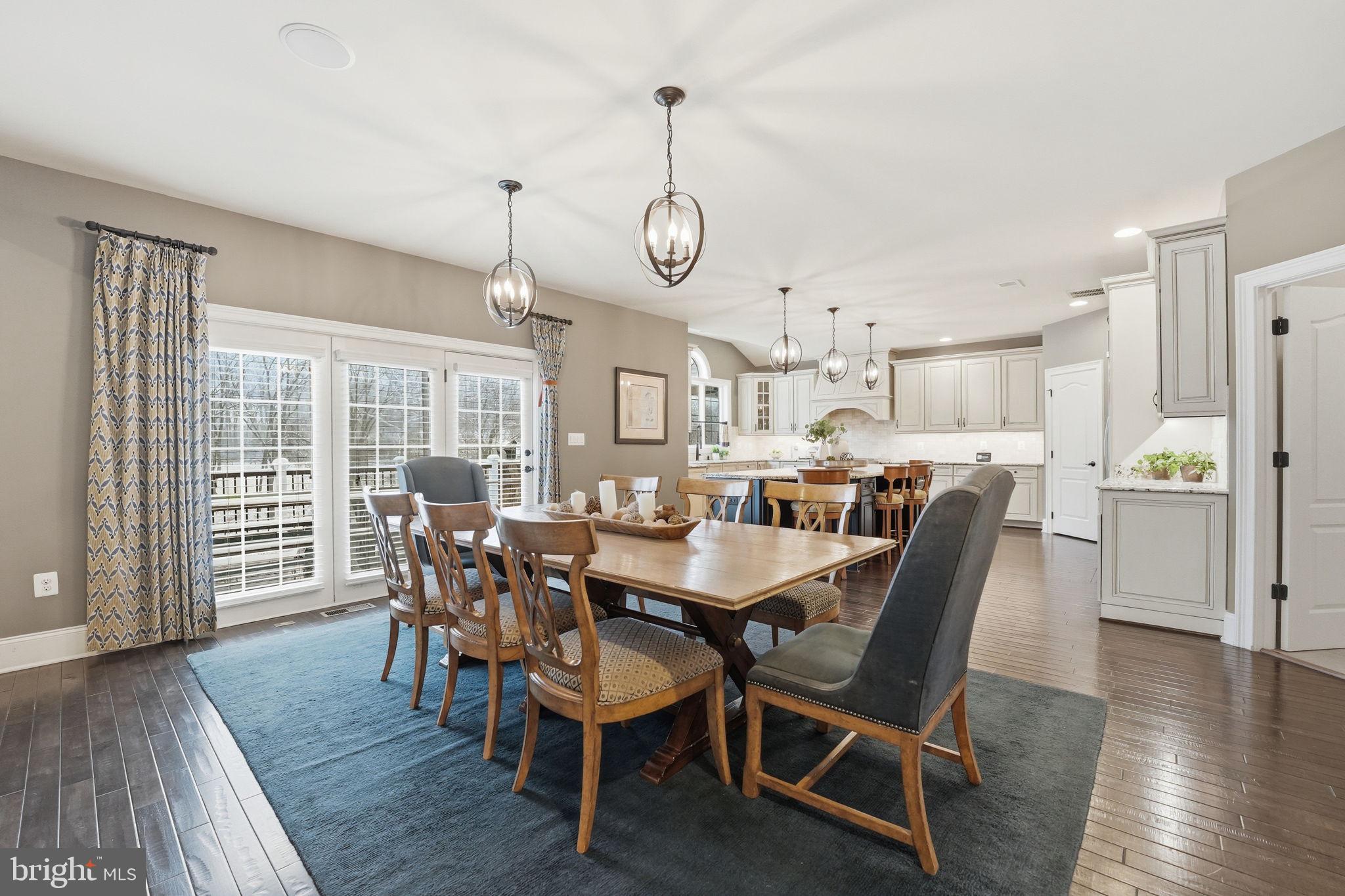 17972 Running Colt Place Leesburg, VA 20175 - Photo 27 of 99 a view of a dining room with furniture window and wooden floor