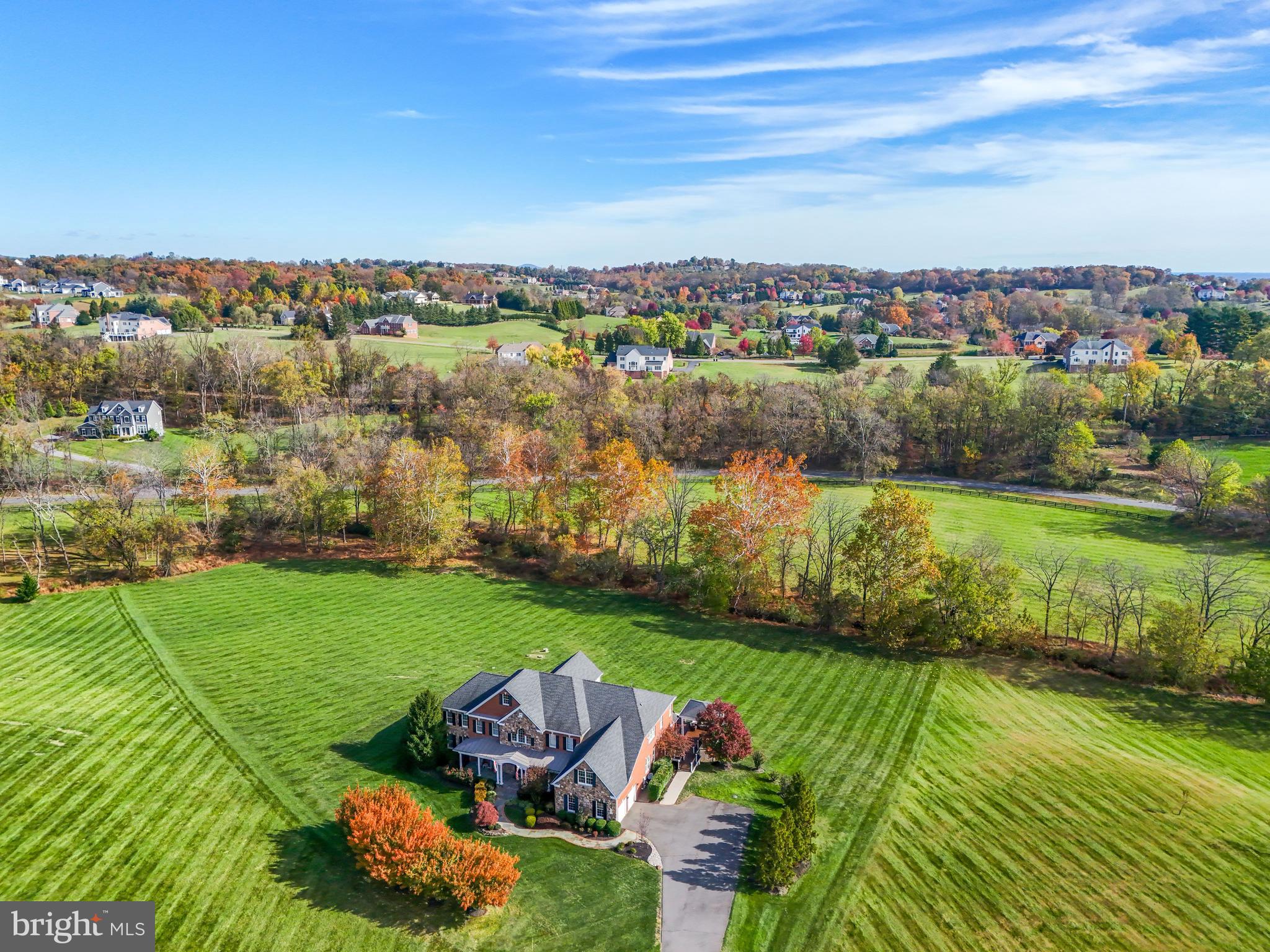 17972 Running Colt Place Leesburg, VA 20175 - Photo 3 of 99 an aerial view of a house with a garden