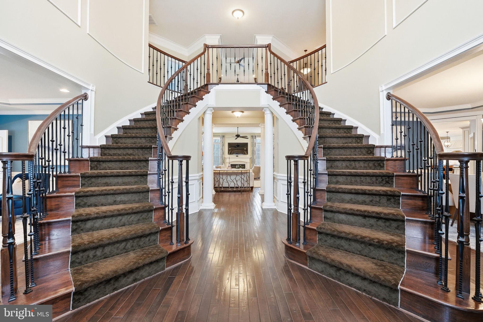 17972 Running Colt Place Leesburg, VA 20175 - Photo 7 of 99 a view of entryway and hall with wooden floor