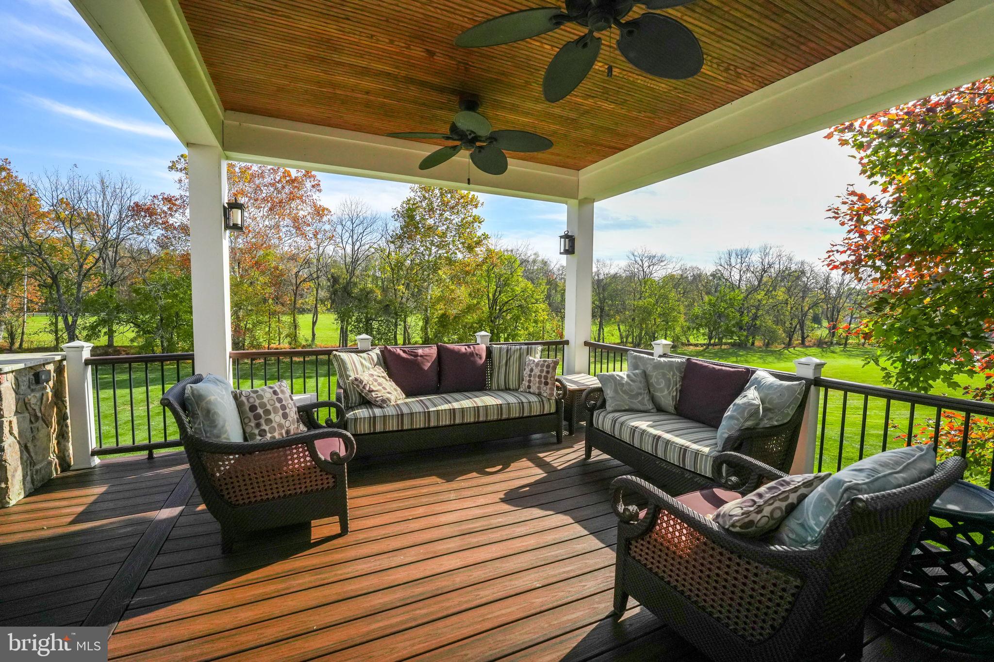 17972 Running Colt Place Leesburg, VA 20175 - Photo 82 of 99 a balcony with furniture and wooden floor