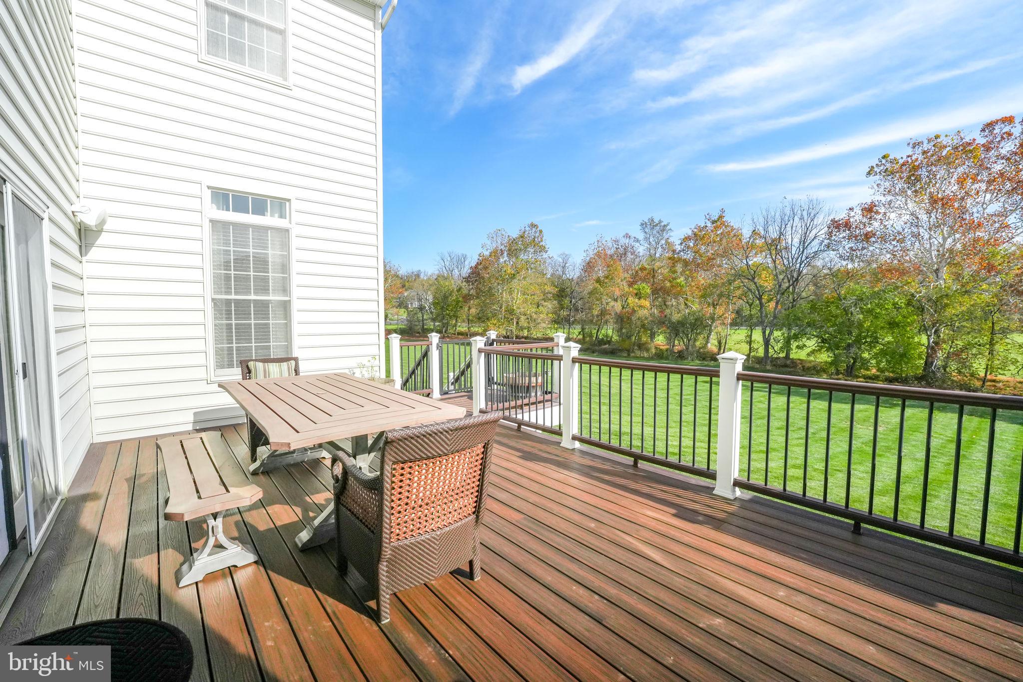 17972 Running Colt Place Leesburg, VA 20175 - Photo 88 of 99 a view of balcony with furniture and wooden deck