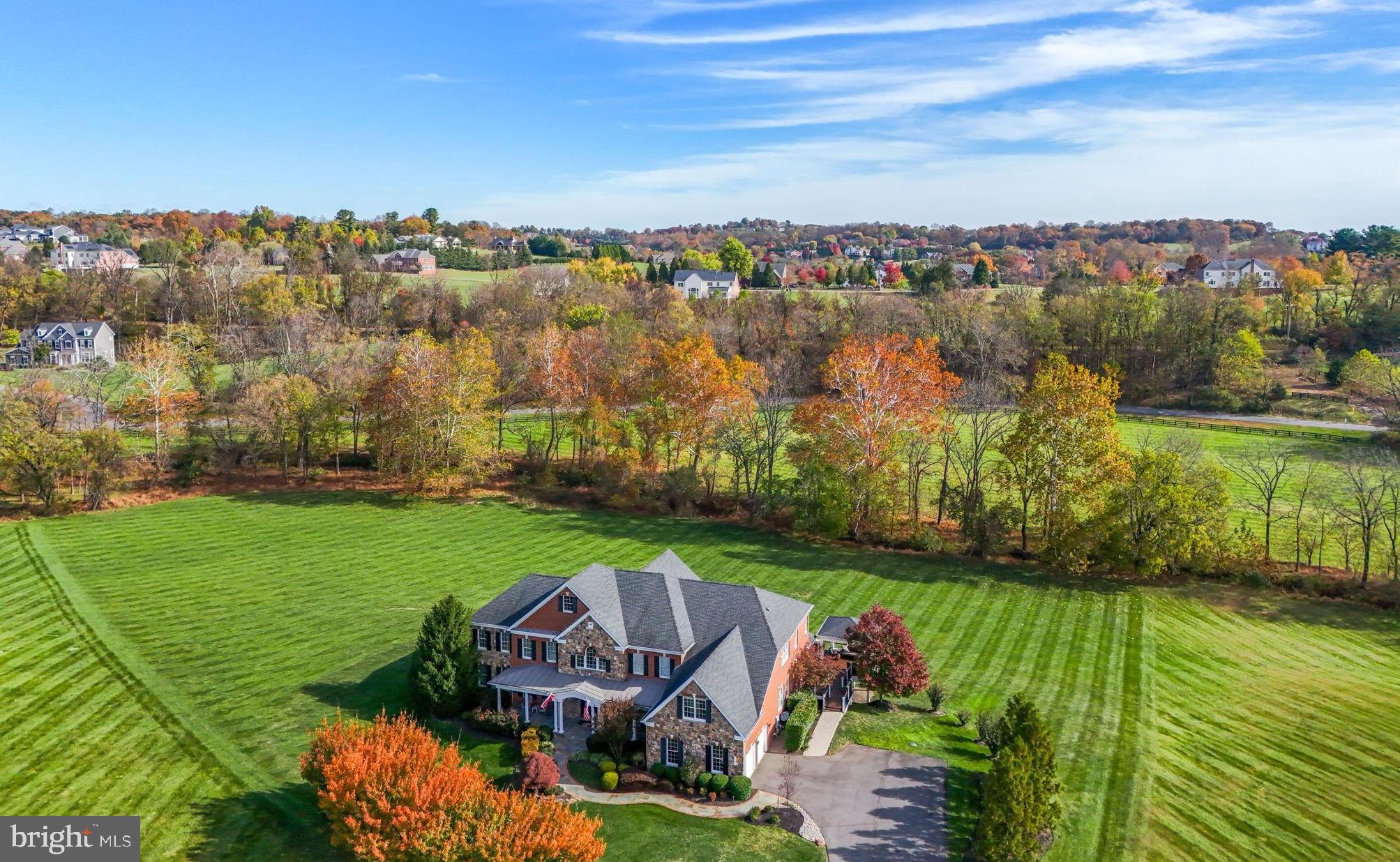 17972 Running Colt Place Leesburg, VA 20175 - Photo 89 of 99 an aerial view of a house with a garden