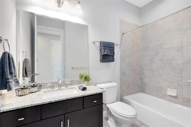 a view of livingroom with washer and dryer