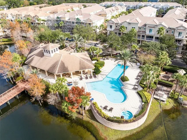 a view of swimming pool with a yard