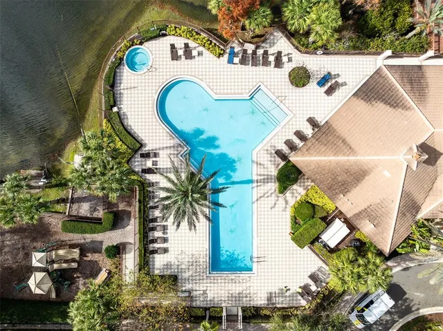 a view of a swimming pool with a garden