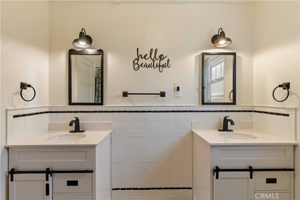 360 3rd Street Lakeport, CA 95453 - Photo 18 of 43 a bathroom with a sink and a mirror
