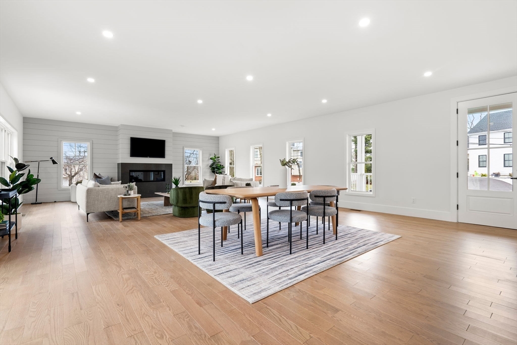 25 Sachem Road Needham, MA 02494 - Photo 15 of 40 a view of a dining room with furniture window and wooden floor
