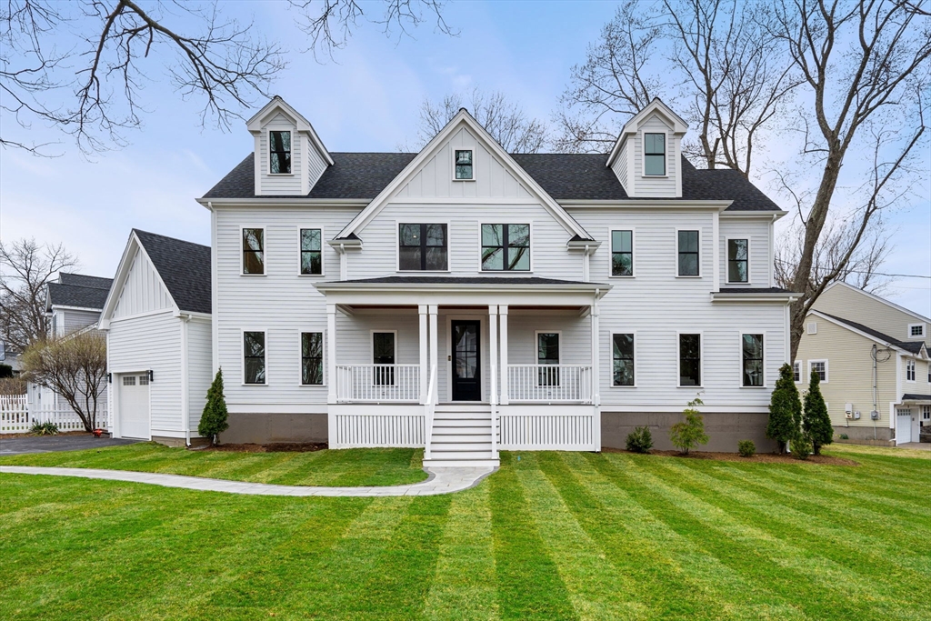 25 Sachem Road Needham, MA 02494 - Photo 2 of 40 a front view of a house with a yard