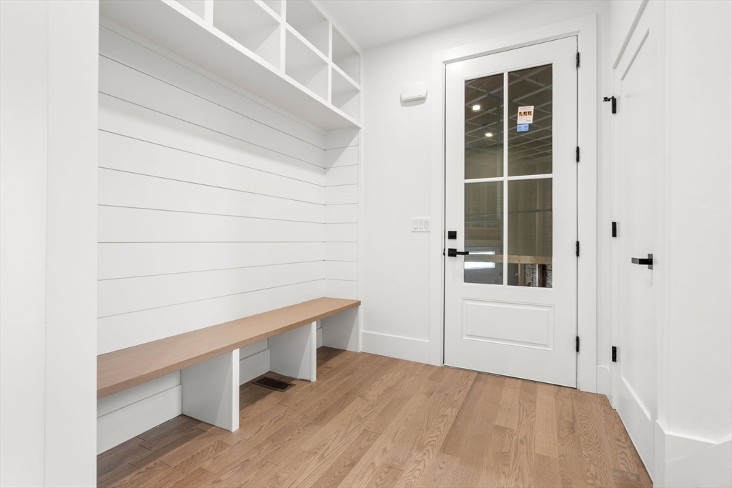 25 Sachem Road Needham, MA 02494 - Photo 24 of 40 a view of an empty room with wooden floor and windows