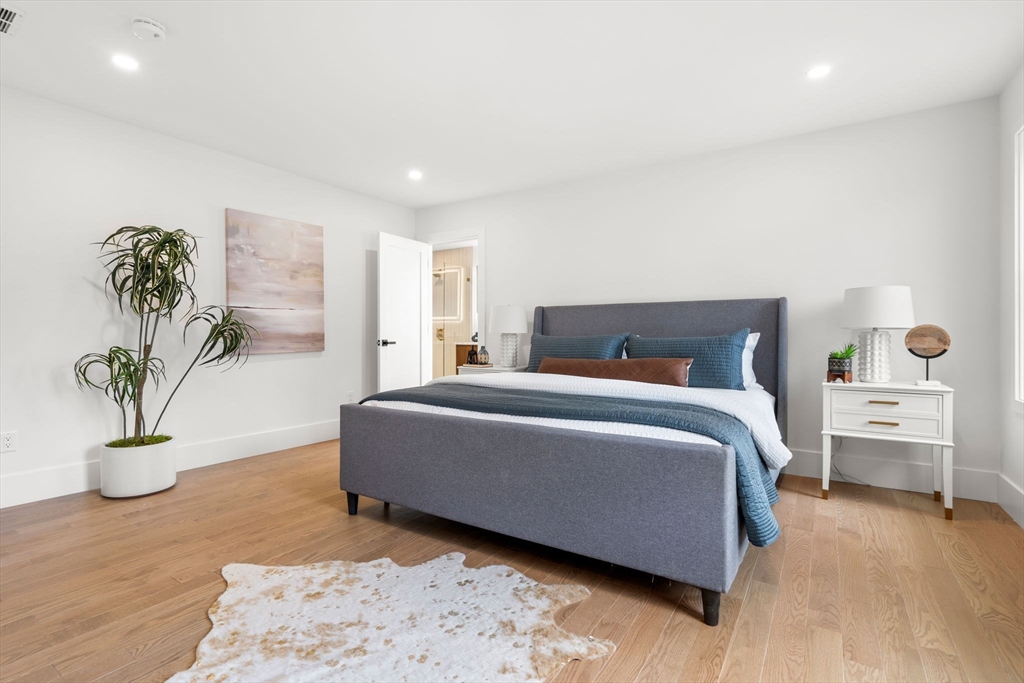 25 Sachem Road Needham, MA 02494 - Photo 25 of 40 a bedroom with a bed and window