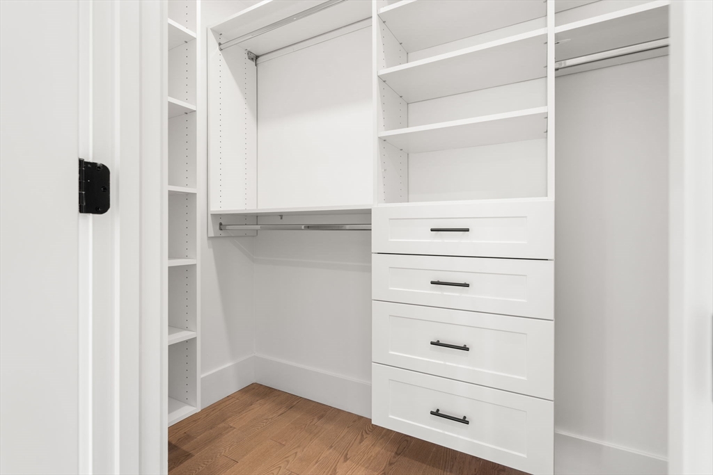 25 Sachem Road Needham, MA 02494 - Photo 37 of 40 a view of walk in closet with empty racks