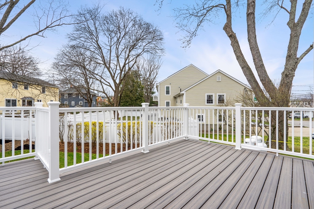 25 Sachem Road Needham, MA 02494 - Photo 4 of 40 a view of a wooden balcony